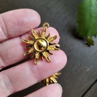 Berlock sol, antikguld, 2 st
